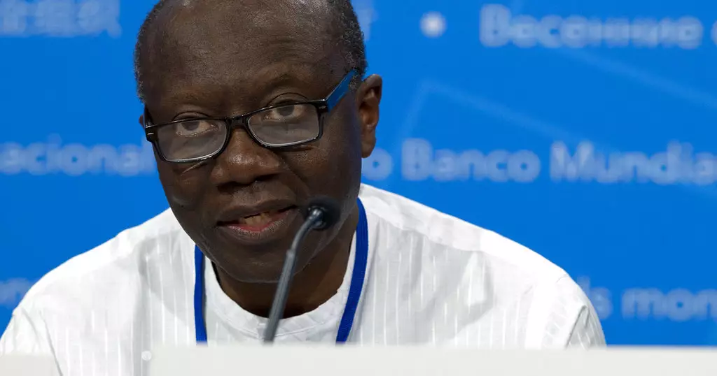 Ghana’s finance minister ‘really sorry’ for financial disaster, fends off criticism
