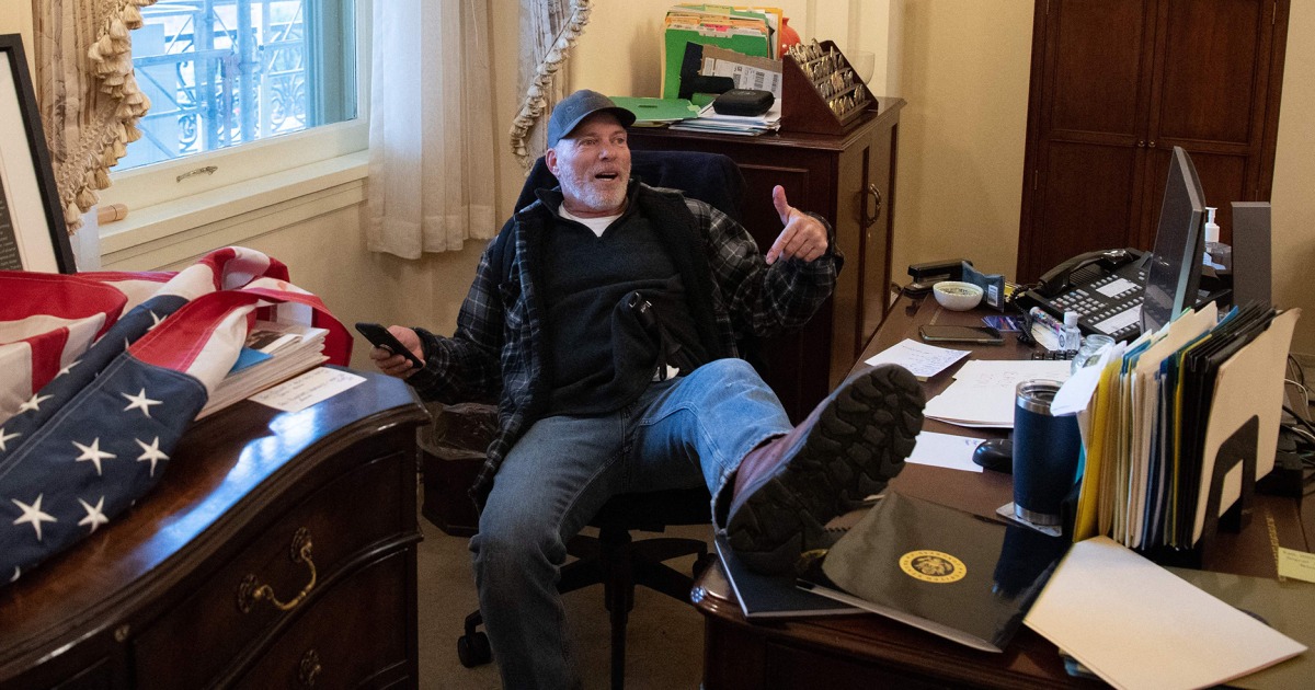 Regrets? Jan. 6 defendant photographed together with his toes on Pelosi’s desk says he has a couple of