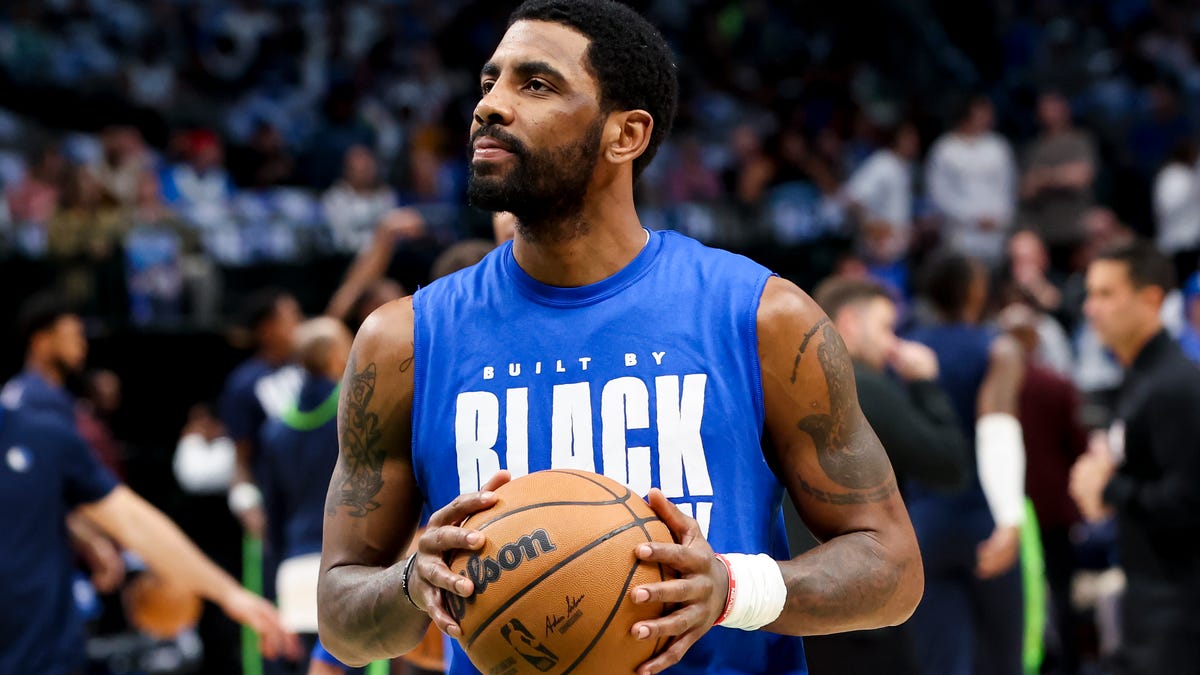 Kyrie Irving speaks on taking part in with Luka Doncic, carrying on ‘uncle’ Dr. J’s legacy in Mavs introduction