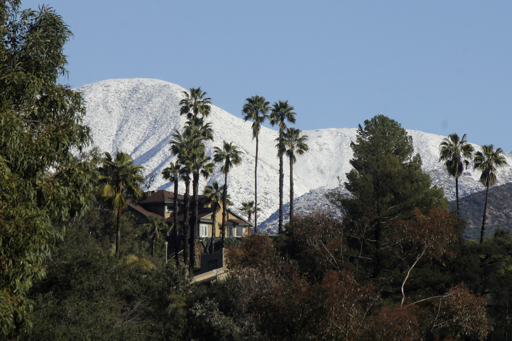 Snow, graupel fall on Los Angeles and Disneyland throughout California storm