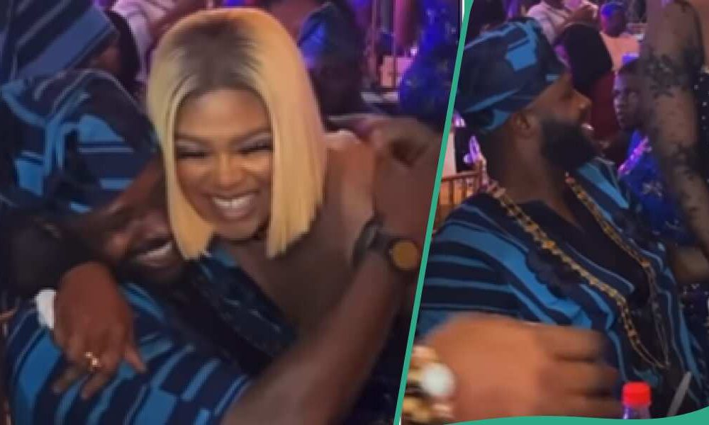 drama-as-actor-femi-adebayo-seems-to-gather-paper-from-woman-at-celebration.png Drama as actor Femi Adebayo seems to gather paper from woman at celebration