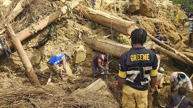 Papua New Guinea’s PM pays respects to neighborhood devastated by landslide