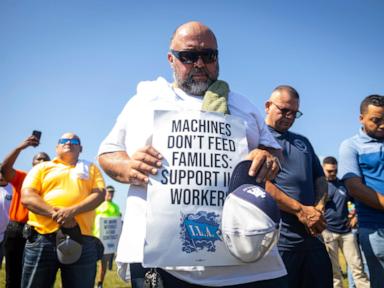 Dockworkers be a part of different unions in attempting to fend off automation, or decrease the affect