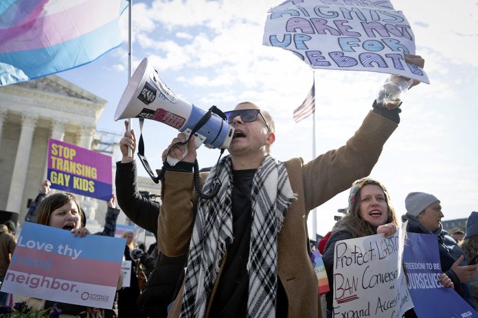 What’s at stake within the Supreme Court docket case on transgender well being care