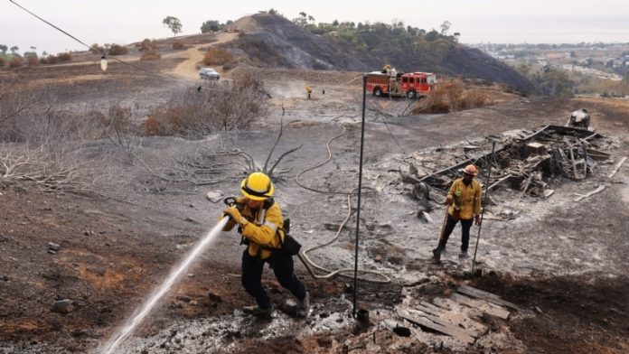 California’s Malibu stays underneath menace of flames, 1000’s evacuated