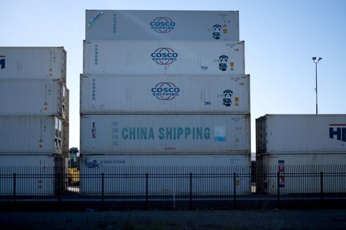 US items commerce deficit widens sharply in December on imports