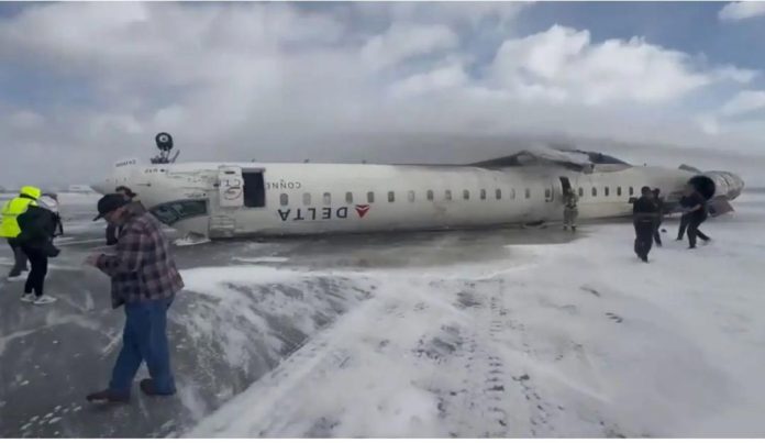 Delta aircraft overturns on touchdown at Toronto Airport