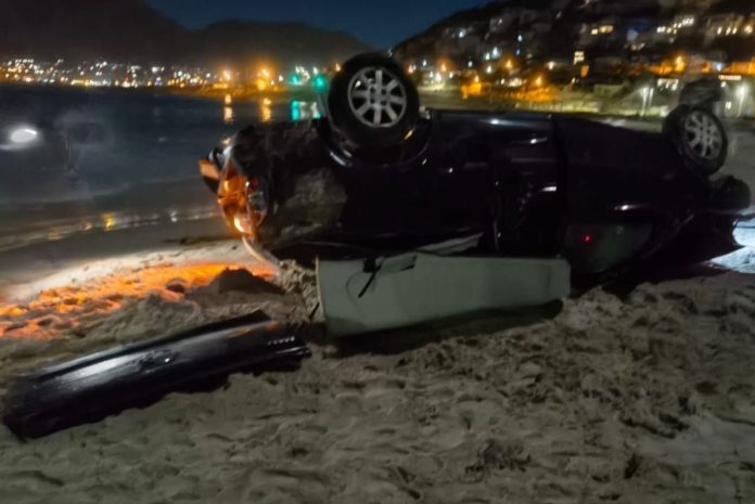 Car finally ends up on Glencairn Seaside after horror crash – WATCH