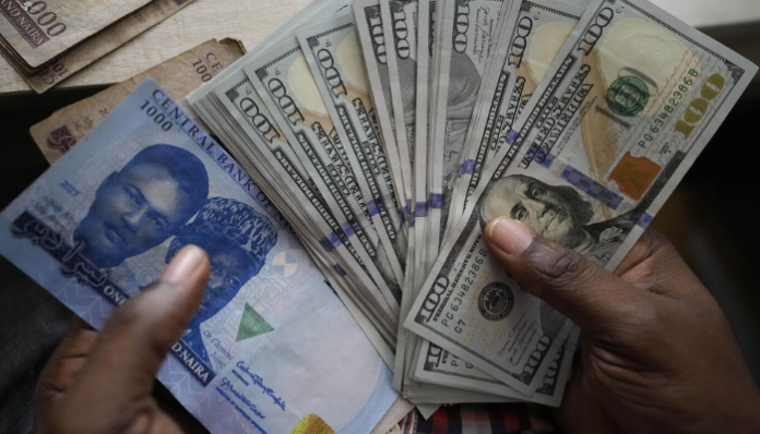 Nigeria’s naira strengthens as oil rises and commerce worries ease
