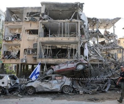 Israel, Iran resume missile exchange, threaten more attacks