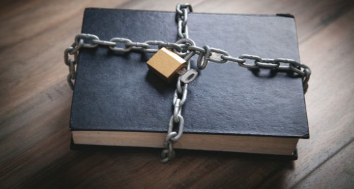 Why Oppressive Fictional Societies Suppress Reading–and How They Mirror Our Current Culture