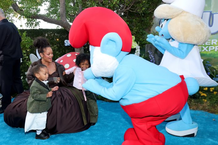 Pregnant Rihanna Beams Holding Hands With Her 2 Sons at ‘Smurfs’ Premiere