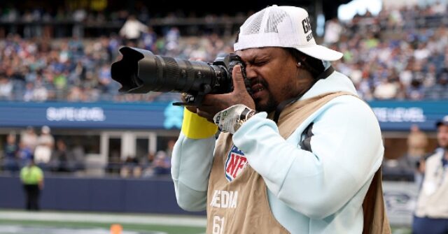 WATCH: Marshawn Lynch Throws Elbow to Protect Camera from Seahawks RB