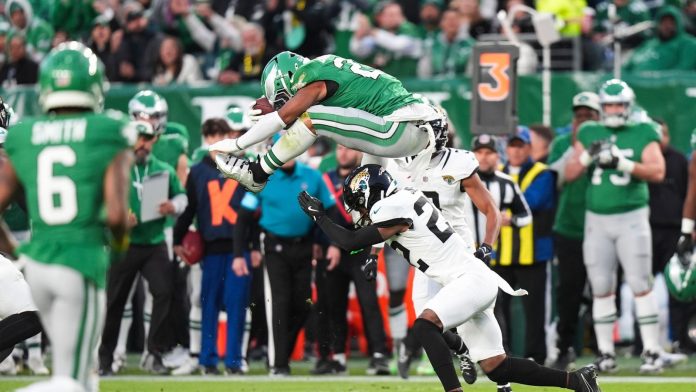 Most athletic NFL play ever?! Relive Barkley’s incredible reverse hurdle