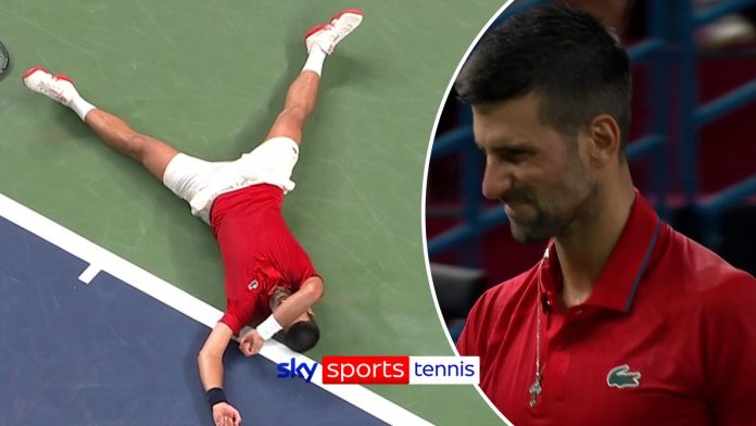 Shanghai Masters: Novak Djokovic falls to ground after losing second set in brutal conditions