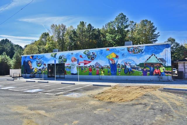 Graceland Thrift Store Reopens November 1 with Community Mural Unveiling