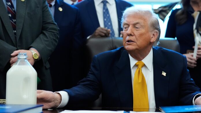 Trump signs law returning whole milk to school lunches