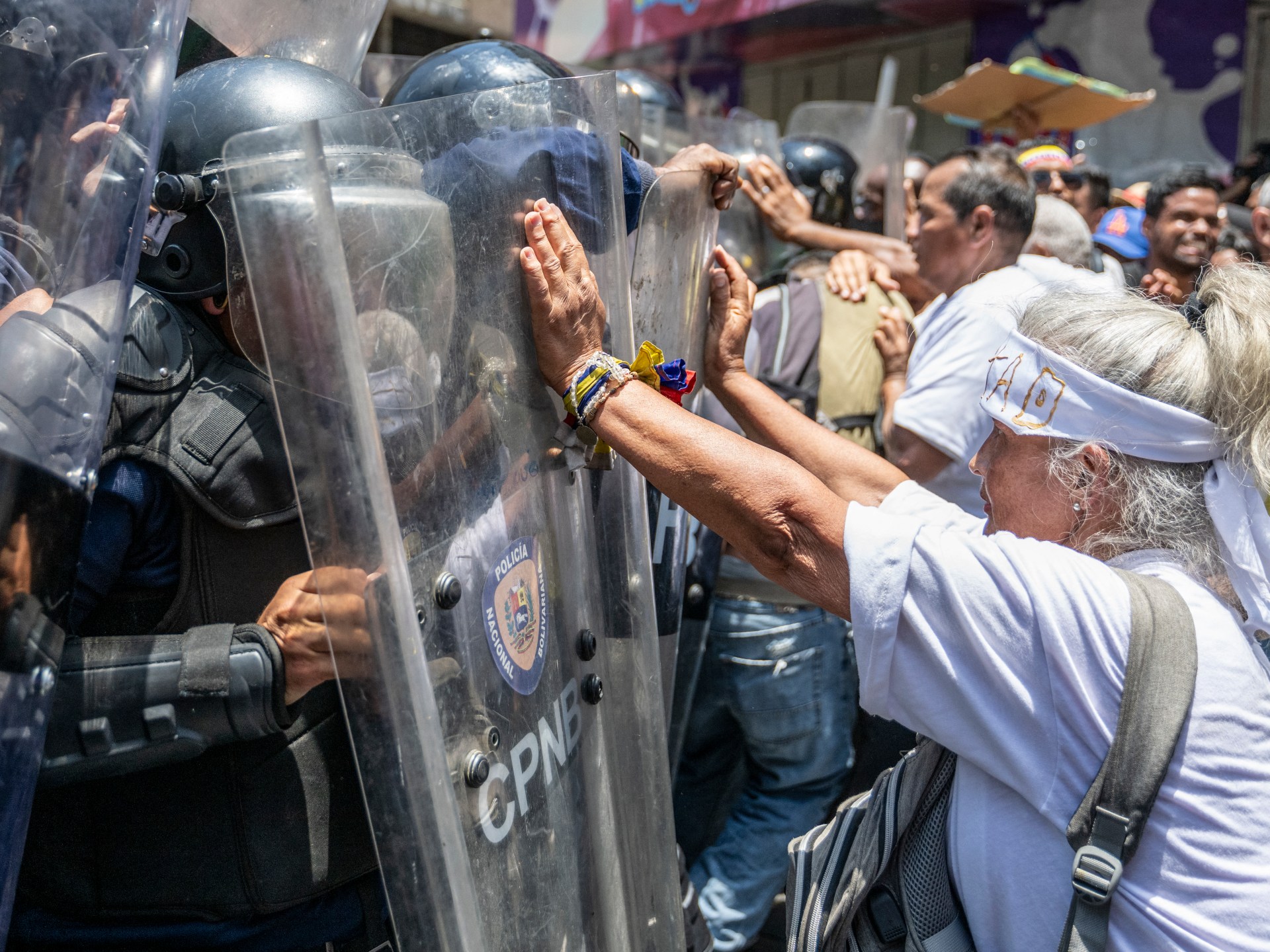 police-in-venezuela-block-protesters-calling-for-higher-wages-pensions.jpg Police in Venezuela block protesters calling for higher wages, pensions
