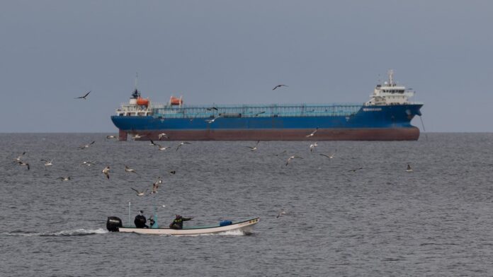 Iran says Strait of Hormuz is closed again as vessels attempting to cross come under fire