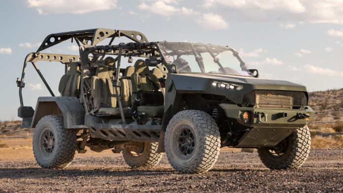 Report: Ford, GM May Reduce New Car Production in Favor of Weapons